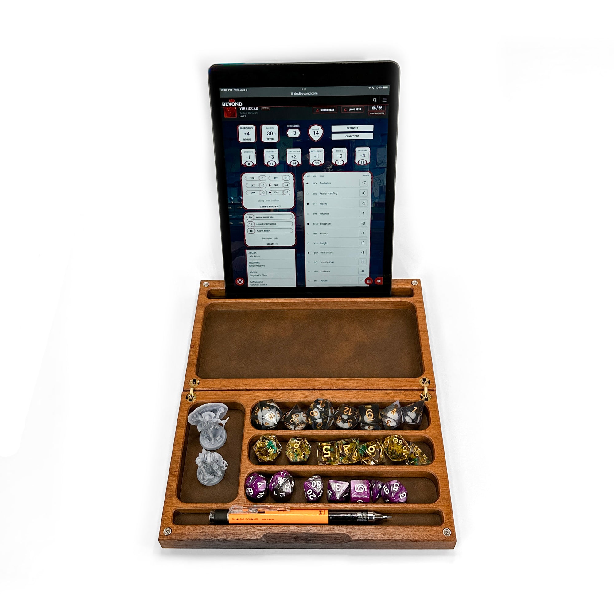 Wooden dice tray with dice and a tablet displaying a game interface on a white background