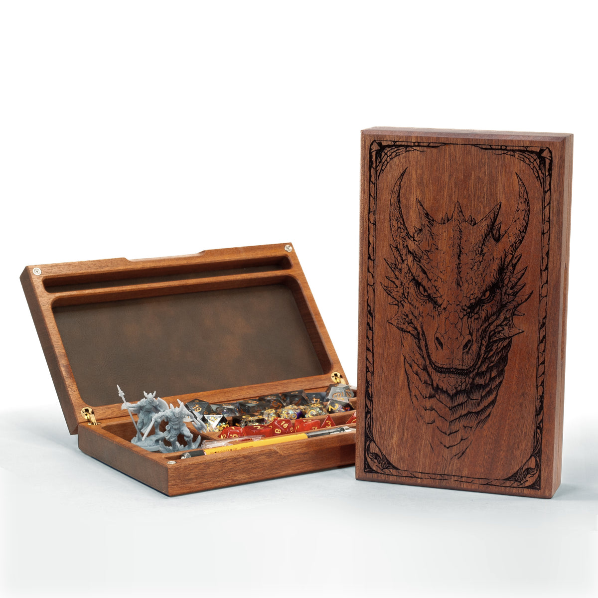 Wooden box with dragon design, open to reveal miniature figurines on a white background
